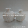 white ceramic vase with marble finish