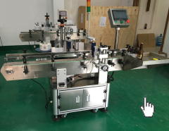 automatic machine for sticking labels on bottles with date printer