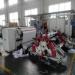 Biaxial center surface slitting and rewinding machine