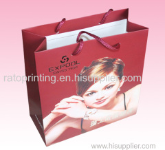 custom wholesale clothing paper shopping bag supplier with satin ribbon handle