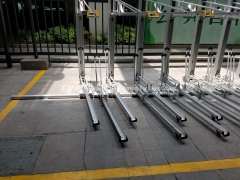 Bike parking lot with gate identification system