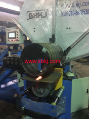 Automatic high speed spiral tubeformer