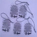 Automatic hang tag threading knot tying machine