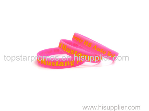 Debossed painted pink silicone wristbands for events