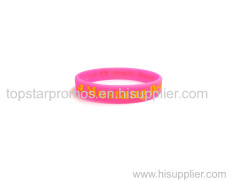 Debossed painted pink silicone wristbands for events