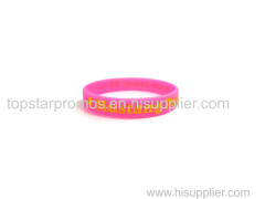 Debossed painted pink silicone wristbands for events