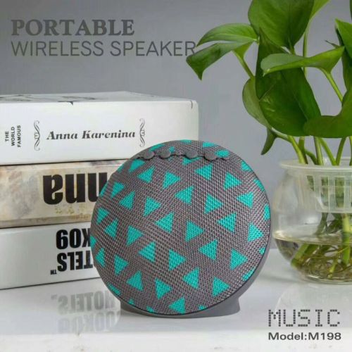 Round design farbic mertail portable wireless bluetooth speaker