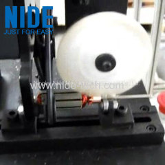 Electric motor rotor commutator deburring machine with brush