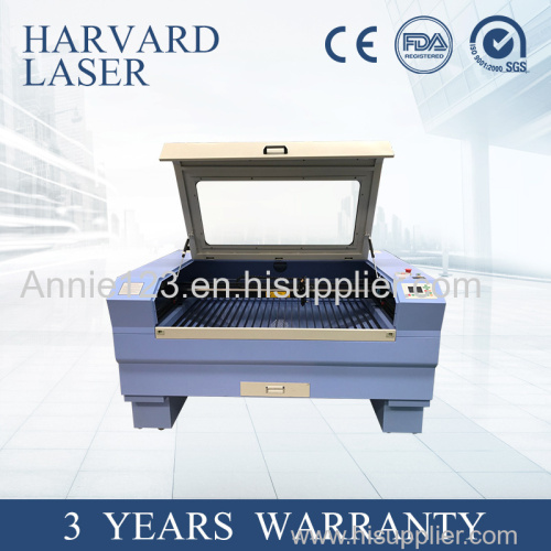 Professional and Cheap Cloth/leather/Acrylic/wood CO2 laser cutting machine price
