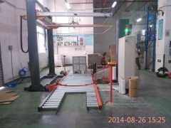 hennopack fully automatic inline pallet top foil cover applicator machine