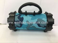 Drum type fabric gun barrel shape Bluetooth speaker with torch flashlight