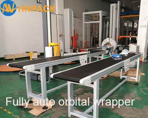 Hennopack fully automatic in line pallet top sheet dispenser machine for palletizer top film cover