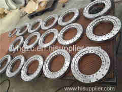 Crossed roller slewing bearings with external gear teeth