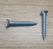 Self tapping screw - oval raised head - cross phillip drive - zinc coated