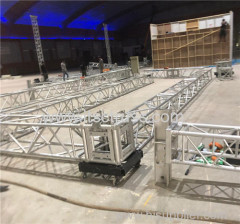 Flat roof lighting truss rigging with 4 towers