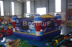 Commercial inflatable bounce house with rocket theme