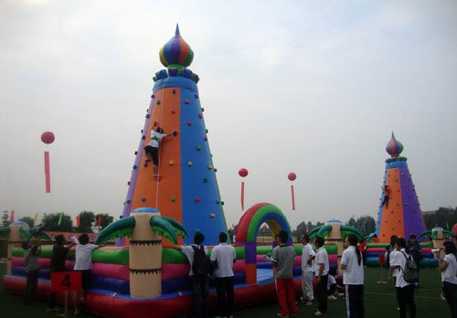 Excitement of inflatable rock climbing sport game