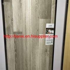 wood hdf board laminated flooring pisos laminado manufacturer in China