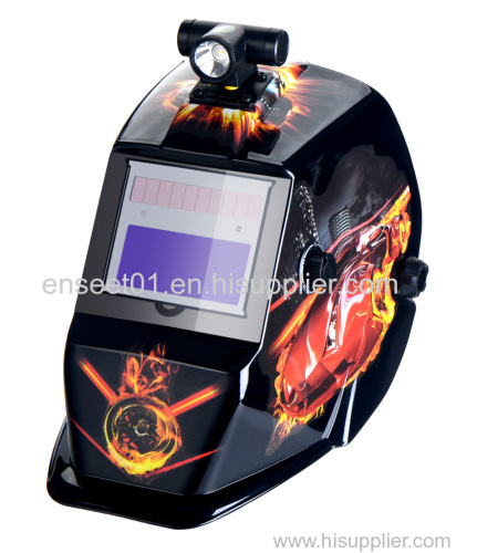 Solar auto-darkening welding helmet