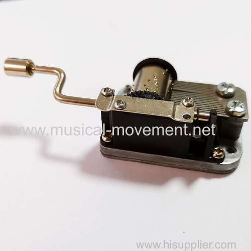 PLASTIC SUPPORT HAND CRANK MUSIC BOX MECHANISM