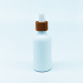 Opaque white essential oil glass botte