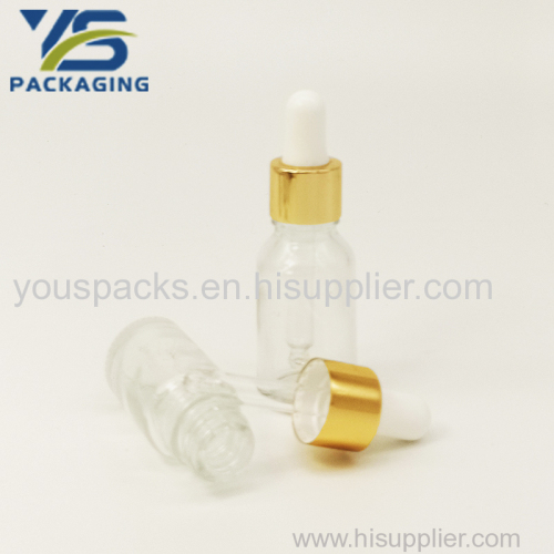 glass bottles with gold aluminum dropper
