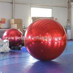 large inflatable ball with mirrored or reflective surfaces typically used for parties and dance events