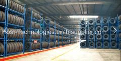 Tire conveying and caging line