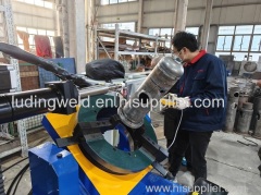 Automatic circumferential seam welding machine for filters.