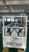 Two Heads Tipping Machine by Credit Ocean