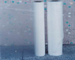 cold water soluble film and hot water soluble nonwoven