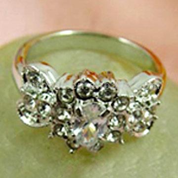 shows a Chinese made replica of the British royal engagement ring left