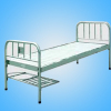 Flat bed with stainless steel bedside, frame