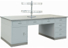 Double face dispensing table with stainless steel surface and holder