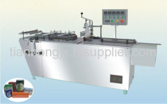 Tridimensional cellophane packaging machine
