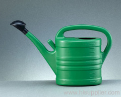 green watering can