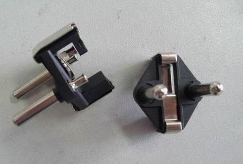 Turkish plug insert with hollow brass pins