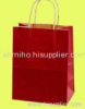 Kraft paper bag with twisted paper handled