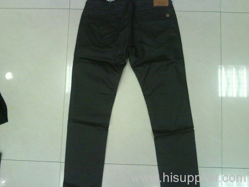 black coated fabric jeans