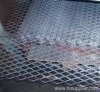 Flattened expanded metal mesh