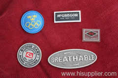 Rubber patches, emblems and badges made of PVC, TPU and silicon; garment labels and tags