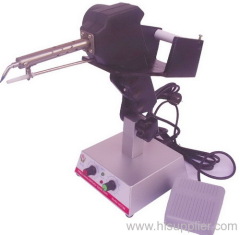 Foot soldering machine