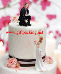 Bride Reaching And Helpful Groom Cake Topper