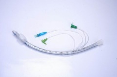 Endotracheal tube with suction catheter