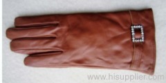 leather gloves with leather chain and diamante button