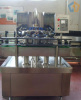 Bactericidal spray machine for beverage bottles