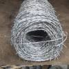 Galvanized barbed wire coil