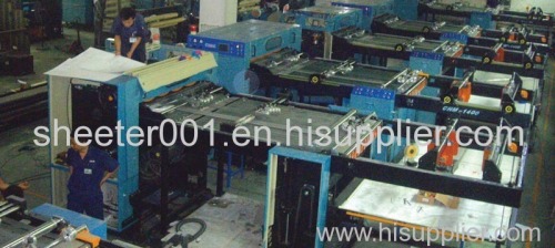 Paper and paperboard sheeting machine