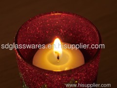 red glass candle holder