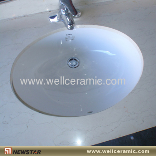 Undermount ceramic vessel sink